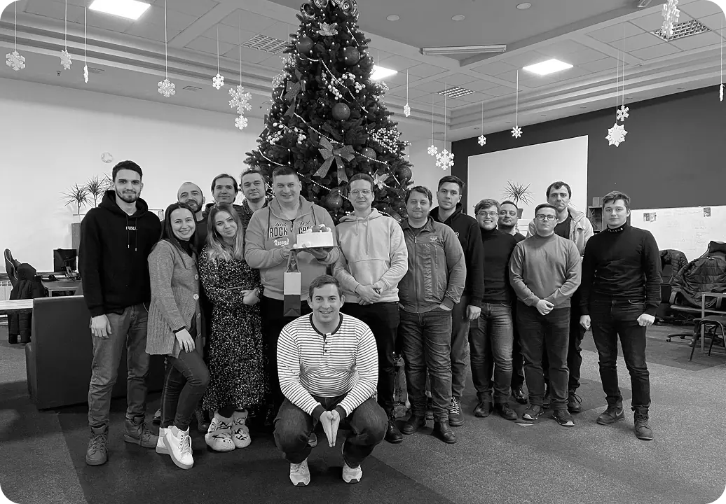 Group photo by a Christmas tree